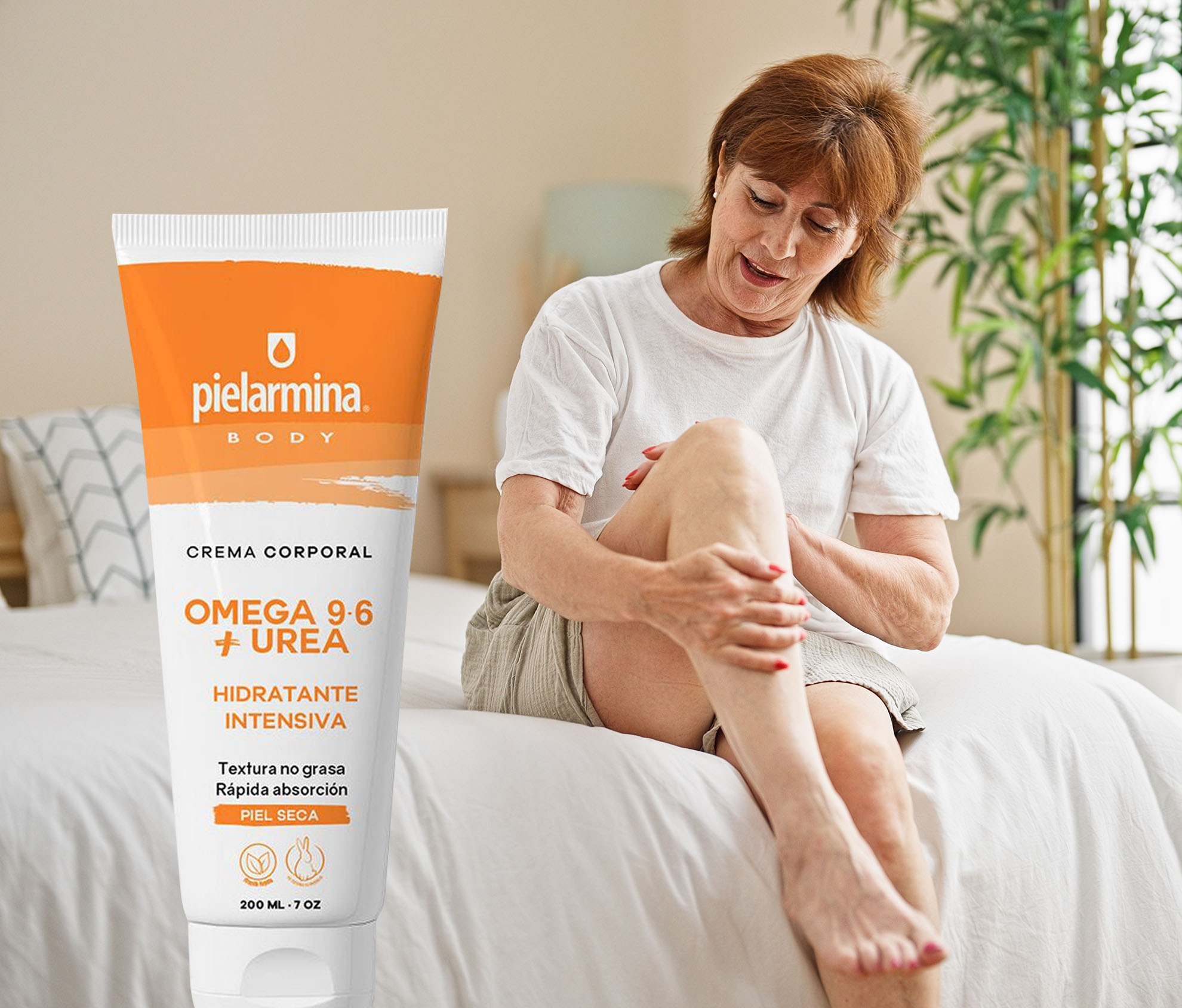 Middle age woman applying lotion on leg sitting on bed at bedroom